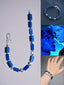 Men’s lapis lazuli bracelet from Identity Series Blue Vanguard, with rectangular blue stone beads and 990 fine silver accents.