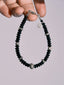 Men's black onyx and hammered silver bracelet from the Urban Stoic Series on a clean light background