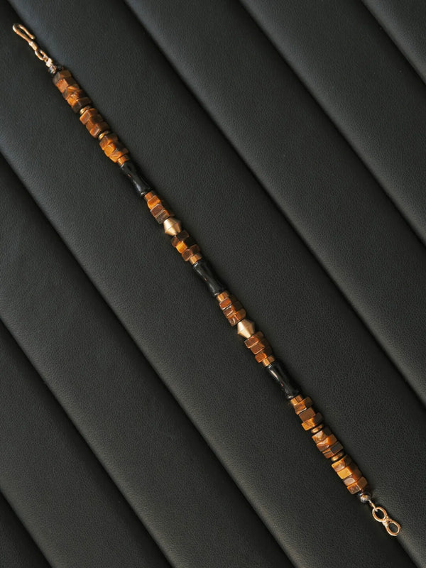 Editorial product display of Silent Authority bracelet highlighting minimalist form and material contrast