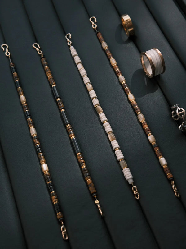 Urban Stoic bracelet set on black leather with rings, showing minimalist men’s jewelry and gift-ready styling