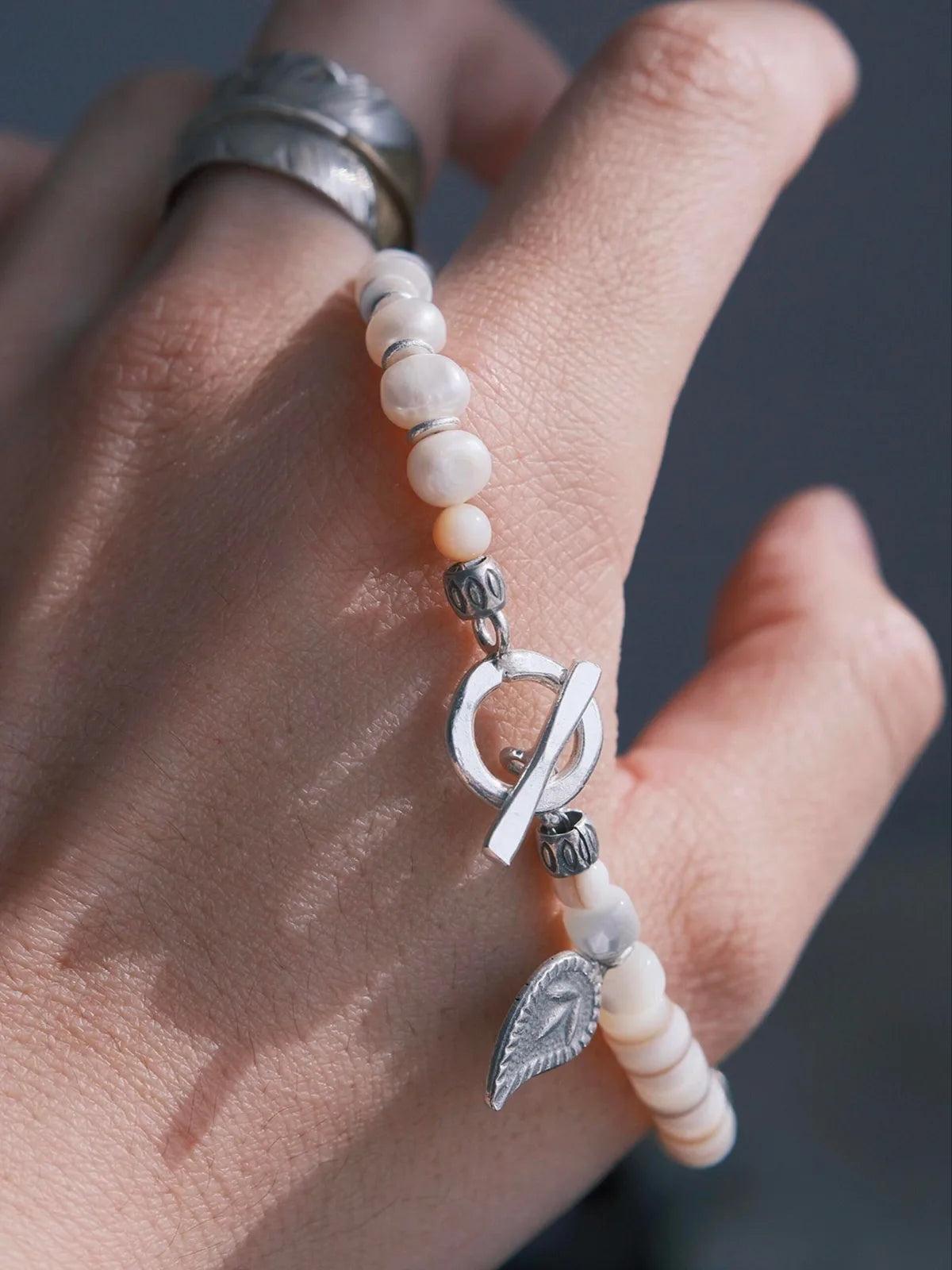 Identity Series | Broken Halo | Shell, Pearl & Sterling Silver Feather Bracelet