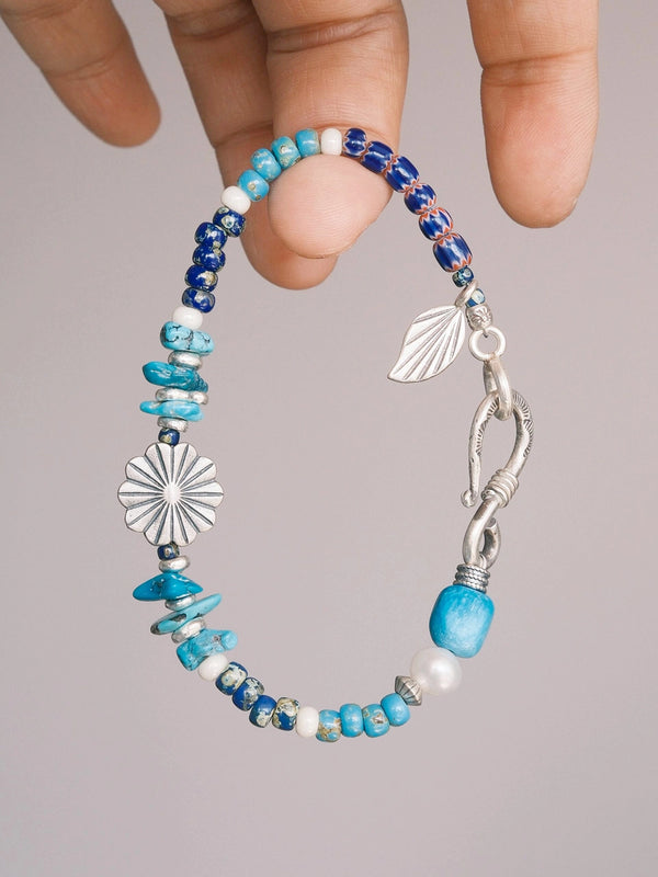 Men’s turquoise bracelet, Mineral Soul Series Stone Bloom, minimal jewelry aesthetic with silver, pearl, and Miyuki colored-glaze details.