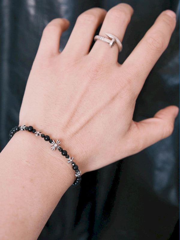 Men’s black onyx bracelet worn on wrist, Urban Stoic Series Eternal Creed, minimal black silver jewelry for daily wear