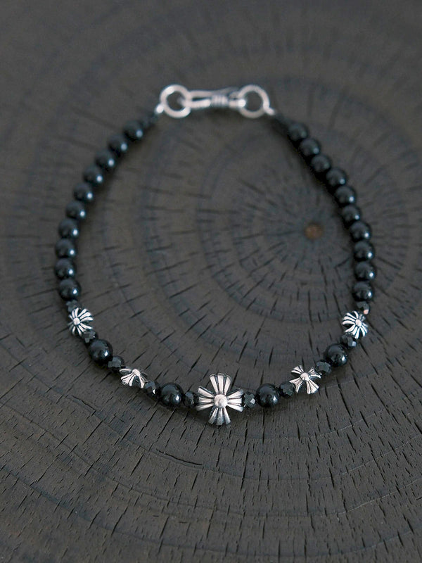 Gift-ready men’s black onyx bracelet with sterling silver cross-heart details, meaningful bracelet gift for him