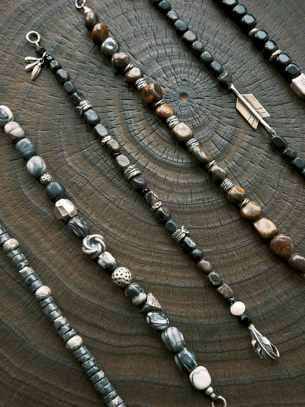 Meaningful gift for him featuring Urban Stoic Series Dark Wing bracelet with black onyx, pearl, sterling silver, and gift-ready masculine styling.