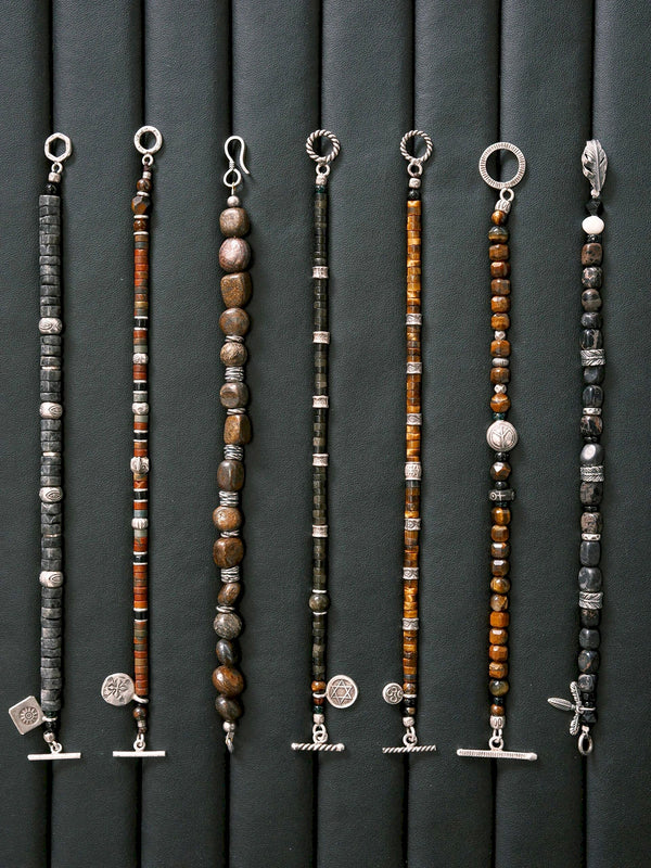 Meaningful gift for him featuring Urban Stoic Series Dark Wing bracelet with black onyx, pearl, sterling silver, and gift-ready masculine styling.
