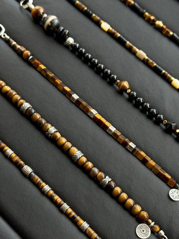 Meaningful gift bracelet for him, Urban Stoic Series Black Dominion, crafted with obsidian, tiger eye, black onyx, hematite, and silver details.