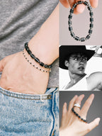 Men’s black-silver bracelet styled with denim and casual outfit, black onyx beads, everyday masculine jewelry.