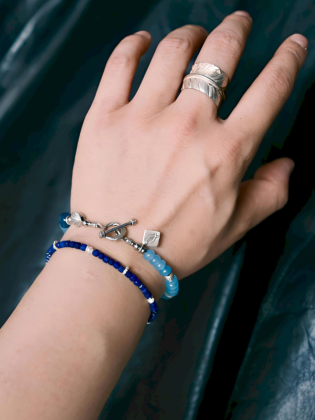 Men’s blue chalcedony silver bracelet worn with dress shirt and watch, refined office outfit accessory for daily wear