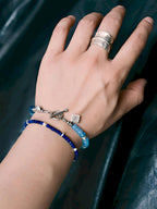 Men’s blue chalcedony silver bracelet worn with dress shirt and watch, refined office outfit accessory for daily wear