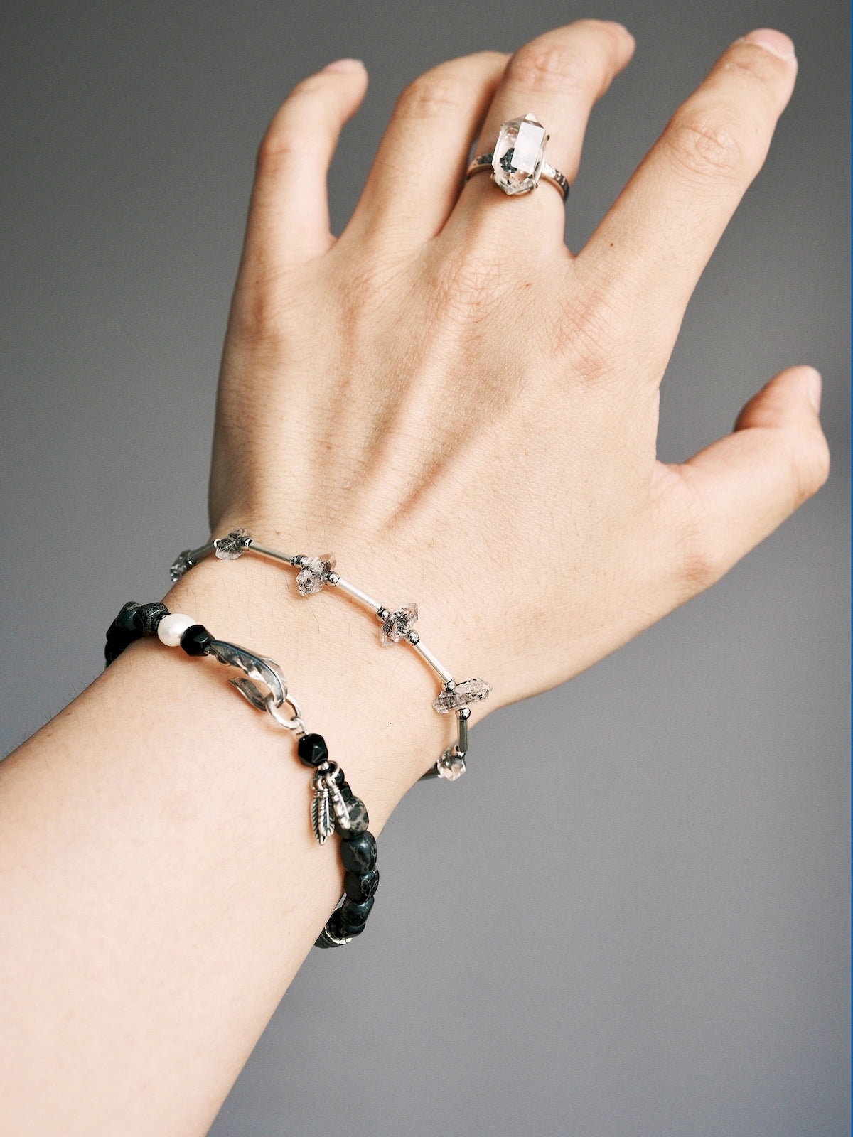 Men’s sterling silver and Herkimer quartz bracelet worn on wrist, Urban Stoic daily wear jewelry aesthetic