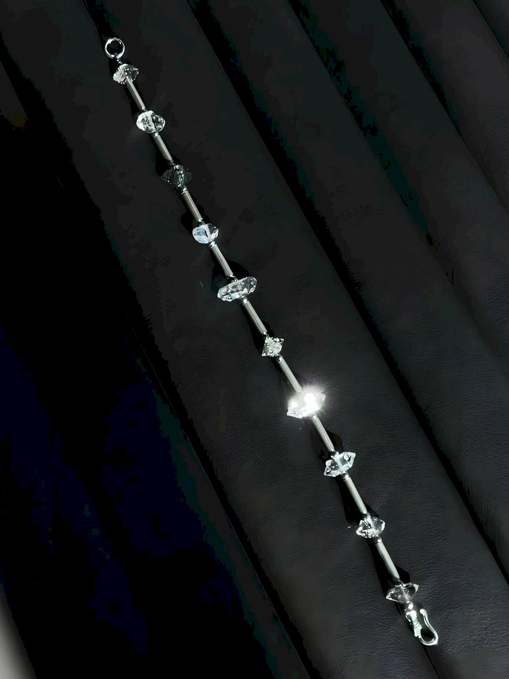 Stellar Thorn bracelet displayed as art object, raw quartz and sterling silver men’s jewelry with sharp identity