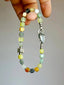 Men’s Xiuyu jade bracelet, Mineral Soul Series, silver feather detail, minimal jewelry aesthetic