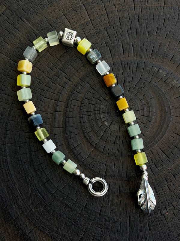 Close-up of natural Xiuyu jade square beads, 925 silver and titanium steel beads, refined finish bracelet